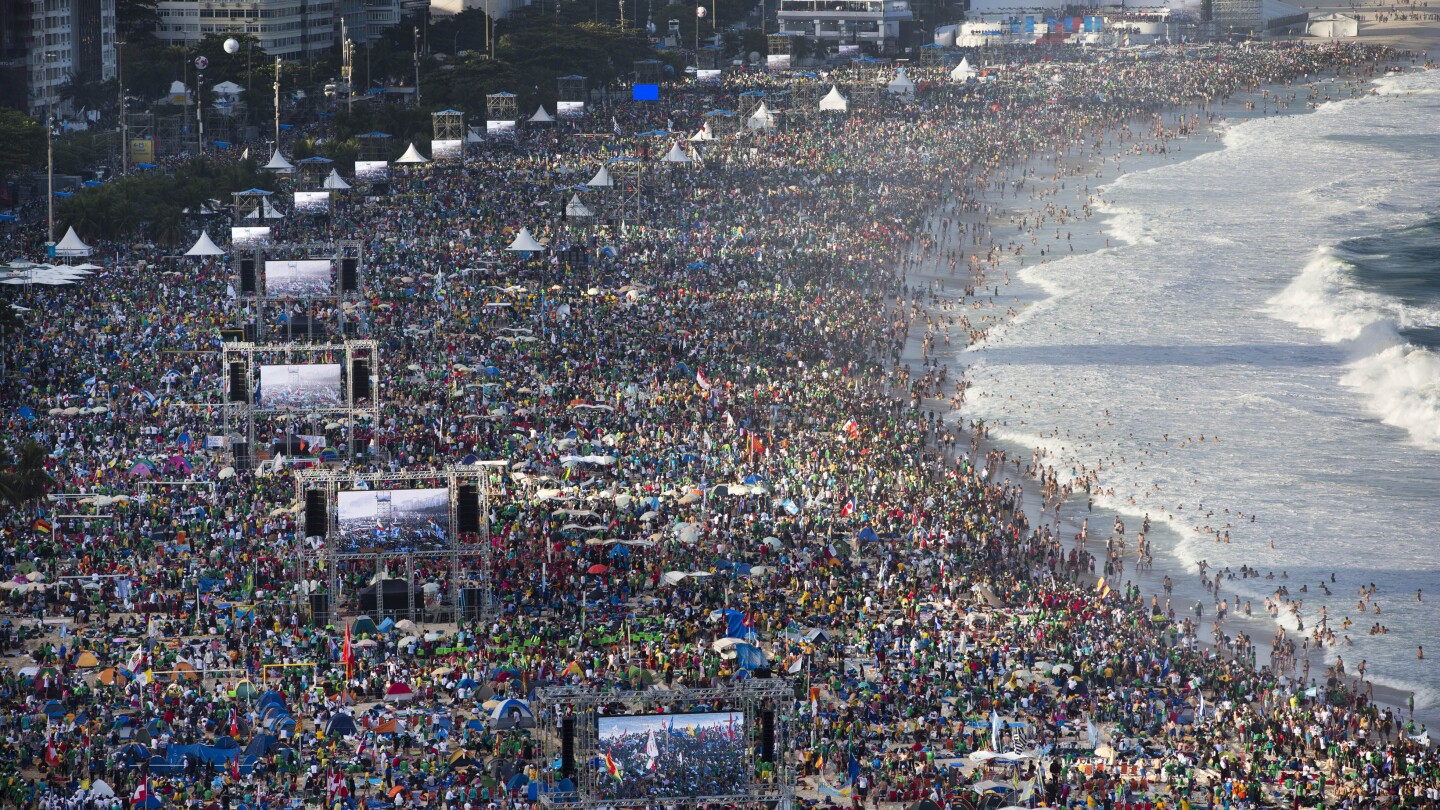 How does the massive crowd for the pope’s Mass in East Timor examine to others?