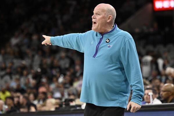 Charlotte Hornets head coach Steve Clifford gestures to his players during the second half of an NBA basketball game against the San Antonio Spurs, Wednesday, Oct. 19, 2022, in San Antonio. Charlotte won 129-102. (AP Photo/Darren Abate)