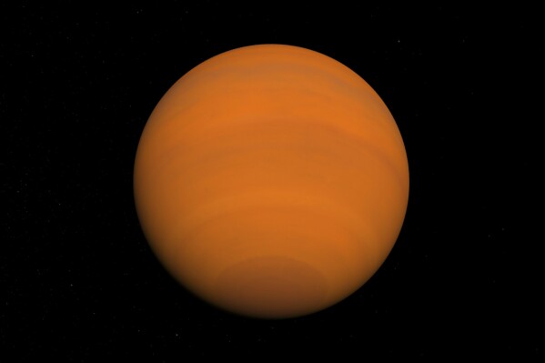 This illustration provided by NASA depicts the planet WASP 193-b. Scientists reported Tuesday, May 14, 2024, that the exoplanet has such low density for its size that it's the consistency of cotton candy. (NASA via AP)