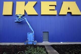 FILE - Site Foreman David Smyth at work on the New IKEA store in Belfast, Northern Ireland, Tuesday, Dec. 11, 2007. Swedish retailer Ikea is known for the distinctive names of its flat-pack home products. The company's Norway branch wants to use the brand's experience to help parents browsing the baby-naming department. Ikea Norway has built “a name bank” with more than 800 listings available on its website. The names are drawn from ones Ikea has given to its furniture instead of product numbers since 1948. (AP Photo/Peter Morrison, File)