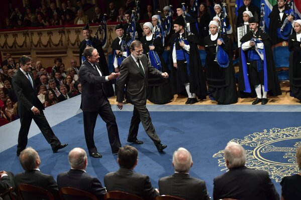 
              Spanish Primer Minister, Mariano Rajoy, arrives at the auditorium during the Princess of Asturias awards ceremony, in Oviedo, northern Spain, Friday Oct. 20, 2017.  The annual Princess of Asturias awards mark international notable achievements in the spheres of the sciences, humanities, and public affairs. (AP Photo/Alvaro Barrientos)
            