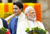 ARCHIVO - El primer ministro de Canadá, Justin Trudeau, izquierda, pasa junto al primer ministro indio, Narendra Modi, mientras participan en una ceremonia de colocación de coronas en Raj Ghat, el lugar de cremación de Mahatma Gandhi, durante la Cumbre del G20 en Nueva Delhi, el domingo 10 de septiembre. 2023. Trudeau dijo que Canadá no buscaba aumentar las tensiones, pero pidió a la India el martes 19 de septiembre que se tomara en serio el asesinato de un activista sij después de que India calificara de absurdas las acusaciones de que el gobierno indio podría haber estado involucrado. (Sean Kilpatrick /The Canadian Press vía AP, Archivo)