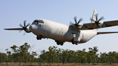 In this photo provided by the Australian Defence Force a AC-130 Hercules aircraft practices landing on the dirt airstrip at Benning Field during Exercise Northern Station 2007 near Townsville, Australia, Sept. 25, 2007. Australia said Monday, July 24, 2023, it will buy 20 new C-130 Hercules from the United States in a 9.8 billion Australian dollar ($6.6 billion) deal that will increase by two-thirds the size of the Australian air force’s fleet of its second-largest heavy transport aircraft. (ADF via AP)