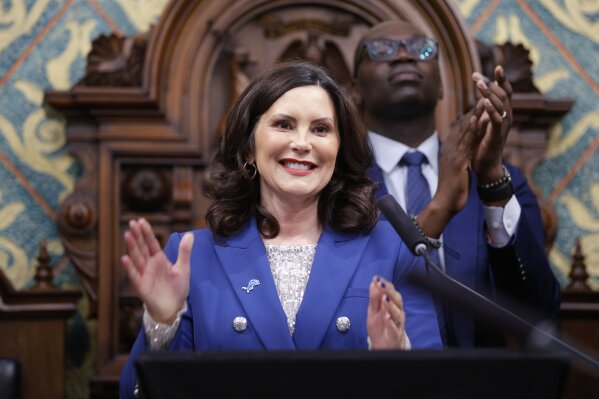 Michigan Gov. Gretchen Whitmer delivers her State of the State address to a joint session of the House and Senate, Wednesday, Jan. 24, 2024, at the state Capitol in Lansing, Mich. (AP Photo/Al Goldis)