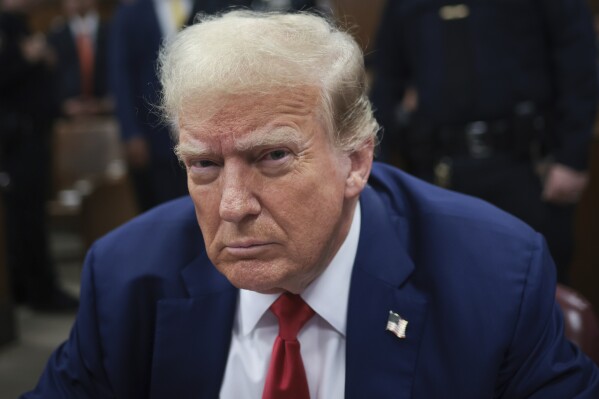 Former President Donald Trump attends a trial in Manhattan Criminal Court on Monday, May 6, 2024, in New York.  (Win McNamee/Pool photo via AP)