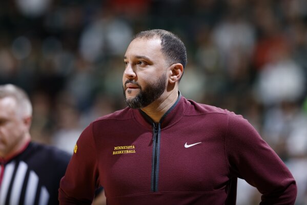 Minnesota coach Ben Johnson watches during the first half of an NCAA college basketball game against Michigan State, Tuesday, Jan. 28, 2025, in East Lansing, Mich. (AP Photo/Al Goldis, File)