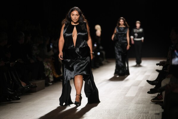 ADDS NAME OF MODEL - Paloma Elsesser wears a creation as part of the Ferragamo women's Fall-Winter 2024-25 collection presented in Milan, Italy, Saturday, Feb. 24, 2024. (AP Photo/Luca Bruno)