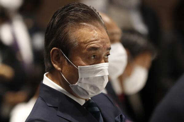 FILE - Haruyuki Takahashi, executive board member of the Tokyo Organizing Committee of the Olympic and Paralympic Games attends the Tokyo 2020 Executive Board Meeting in Tokyo on March 30, 2020. Criminal allegations against a former Tokyo Olympic organizing committee board member widened Tuesday, Sept. 6, 2022, as Japanese prosecutors “re-arrested” Takahashi in suspected payments from a publisher that became a sponsor for the Games.  (Issei Kato/Pool Photo via AP, File)