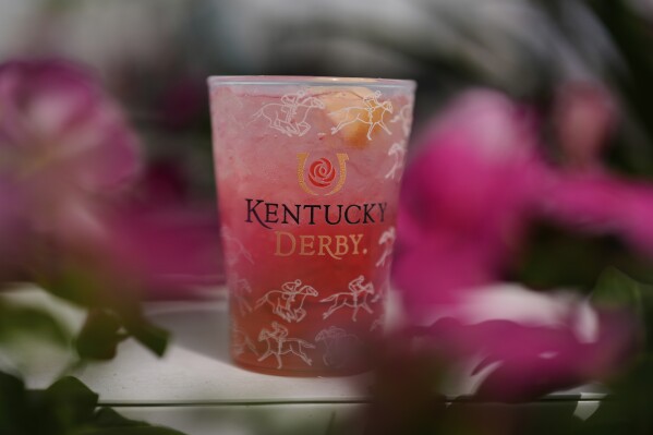 A drink sits on a table at Churchill Downs before the 151st running of the Kentucky Oaks horse race Friday, May 2, 2025, in Louisville, Ky. (AP Photo/Brynn Anderson)