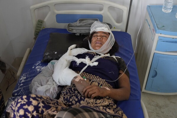 An earthquake victim receives treatment at Bheri hospital in Nepalgunj, Nepal, Saturday, Nov. 4, 2023. A strong earthquake has shaken northwestern Nepal, and officials say more than 100 people are dead and dozens more injured as rescuers search mountain villages. (AP Photo/Niranjan Shrestha)