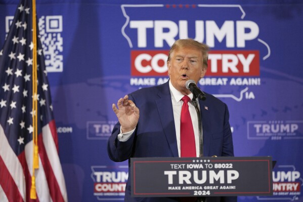 FILE - Former President Donald Trump speaks during a commitment to the caucus rally in Ankeny, Iowa, on Saturday, Dec. 2, 2023.  Political messaging experts say that former President Donald Trump's comment that his supporters should vote in 2024 