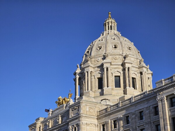 Morning light strikes the Minnesota State Capitol in St. Paul on Wednesday, March 20, 2024. The Minnesota Legislature returns from its Easter break on Tuesday, April 2, with lots of bills in the pipeline. They include a myriad of low-profile proposals but several high-profile pieces of legislation are in the mix, ranging from cannabis and sports betting, to rights for trans people, to maintaining the state's roads and bridges. (AP Photo/Steve Karnowski)