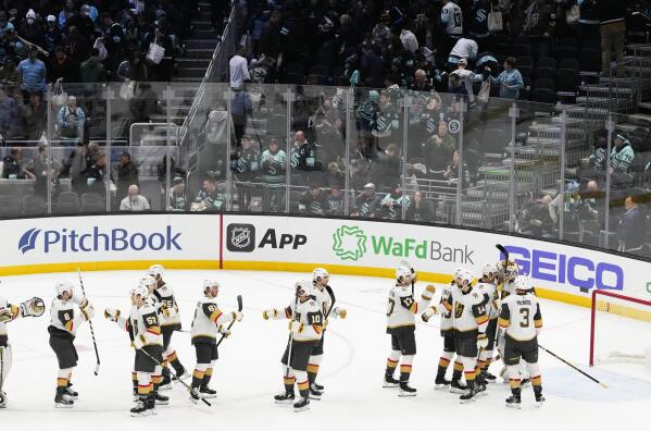 Vegas Golden Knights defenseman Alec Martinez, left, kicks a