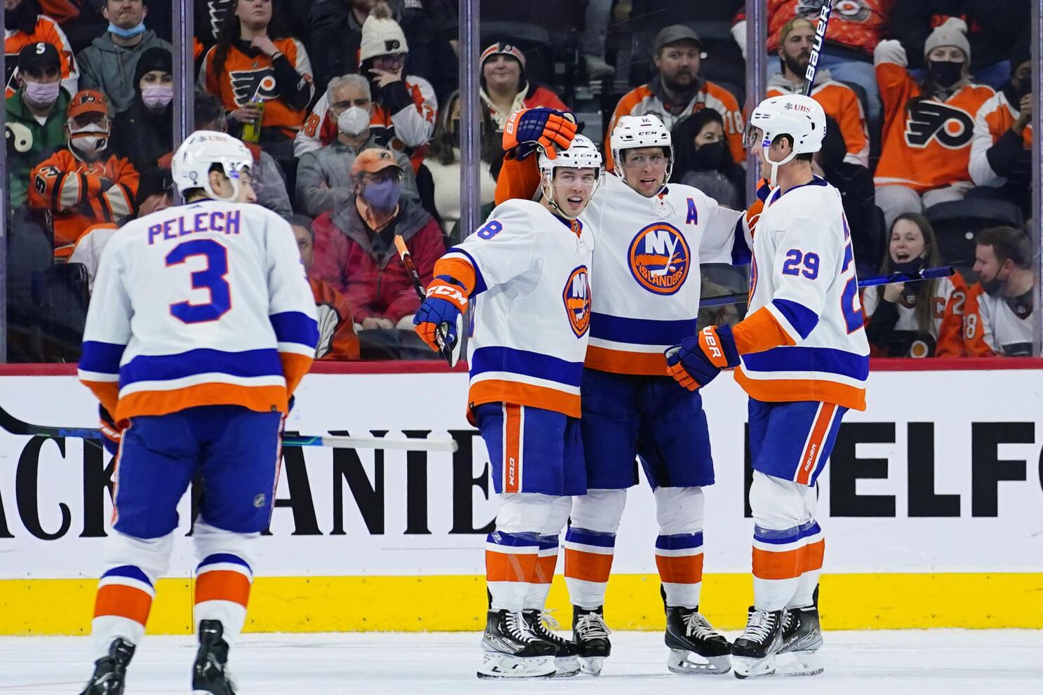 New York Islanders' Semyon Varlamov, left, blocks a shot by Philadelphia  Flyers' Cam York during the second period of a preseason NHL hockey game,  Thursday, Oct. 5, 2023, in Philadelphia. (AP Photo/Matt