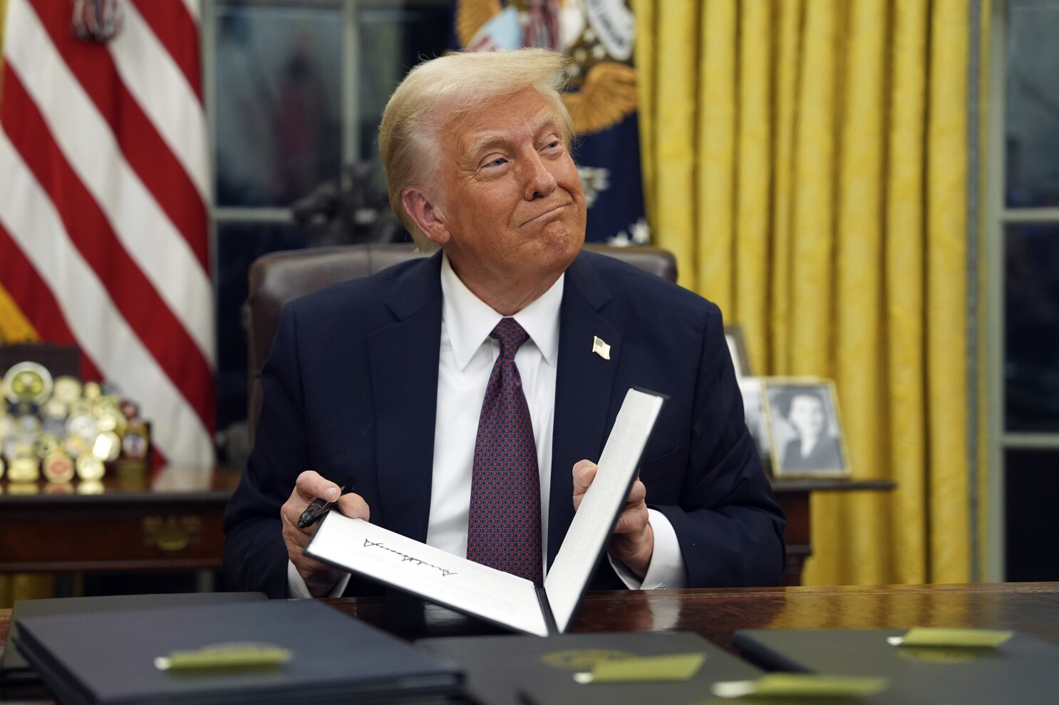 Trump says 25% tariffs on Canada and Mexico coming on Feb. 1 as he signs several orders on economy