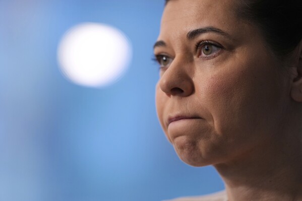 Dani Dumitriu talks to reporters at her office in New York, Thursday, March 20, 2025. (AP Photo/Seth Wenig)