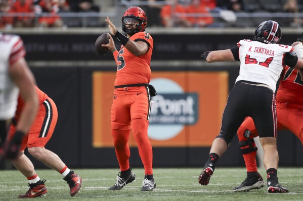Oregon State quarterback DJ Uiagalelei (5) drops back to pass against Utah during the first half of an NCAA college football game Friday, Sept. 29, 2023, in Corvallis, Ore. (AP Photo/Amanda Loman)