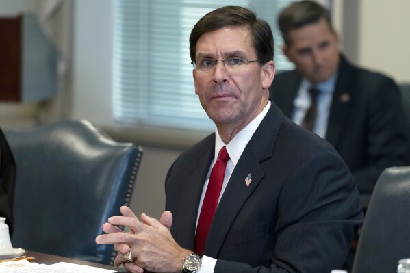 FILE - Secretary of Defense Mark Esper speaks Sept. 22, 2020, at the Pentagon in Washington. As Donald Trump seeks the presidency a third time, he's being shadowed by a chorus of people who served in his administration turned sharp critics. Esper has called Trump a "threat to democracy" and says he won't vote for him in 2024. (AP Photo/Alex Brandon, File)