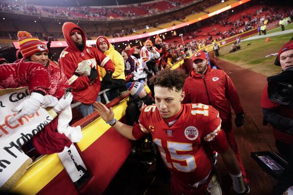 Kansas City Chiefs quarterback Patrick Mahomes (15) speaks with fans after an NFL divisional round playoff football game between the Kansas City Chiefs and the Jacksonville Jaguars, Saturday, Jan. 21, 2023, in Kansas City, Mo. The Kansas City Chiefs won 27-20. (AP Photo/Charlie Riedel)
