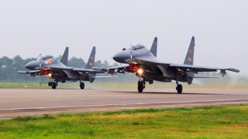 FILE - In this undated photo released by China's Xinhua News Agency, two Chinese SU-30 fighter jets take off from an unspecified location to fly a patrol over the South China Sea. China’s People’s Liberation Army sent 13 aircraft and 6 vessels into airspace and waters around Taiwan over the past 24 hours as of early Saturday, July 8, 2023, overlapping with United States Treasury Secretary Janet Yellen’s visit to Beijing aimed at mending strained relations. (Jin Danhua/Xinhua via AP, File)