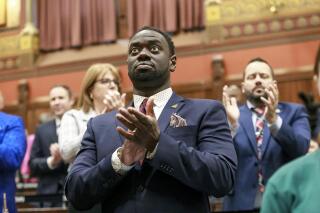 FILE - State Rep. Quentin Williams, D-Middletown, applauds during Connecticut Gov. Ned Lamont's state of the state address, Jan. 4, 2023, in Hartford, Conn. State lawmakers, still grieving the death of Williams, who was killed in a wrong-way crash, gave final legislative approval Friday, June 2, 2023, to a bill that attempts to address the large increase in wrong-way crashes on the state's roads. (Brian O'Connor/Connecticut House Democrats via AP, File)