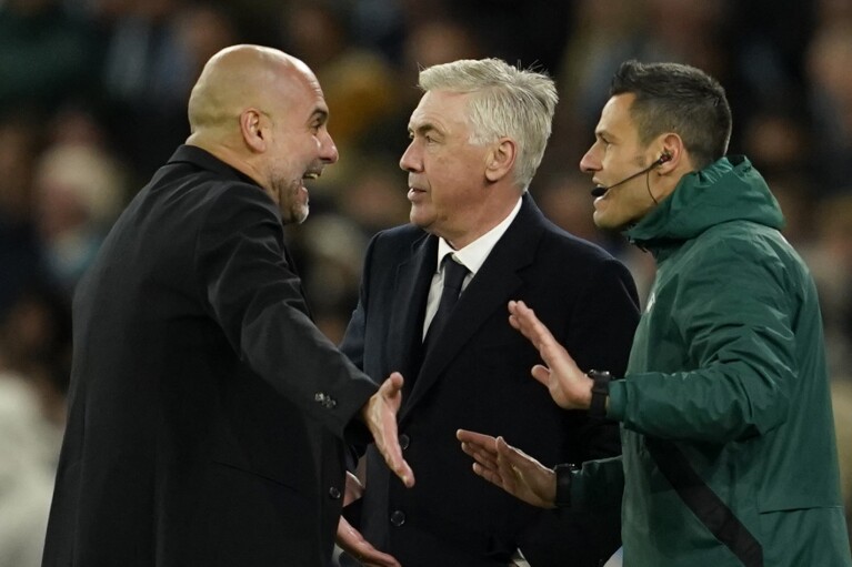 Manchester City's head coach Pep Guardiola argues with the fourth official as Real Madrid head coach Carlo Ancelotti looks on during the Champions League quarterfinal second leg soccer match between Manchester City and Real Madrid at the Etihad Stadium in Manchester, England, Wednesday, April 17, 2024. (AP Photo/Dave Thompson)