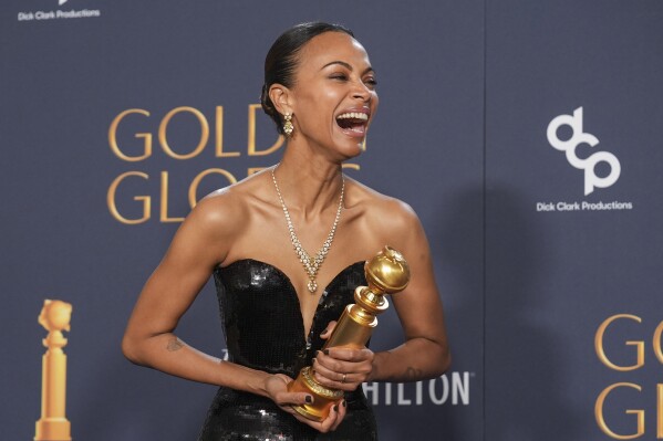 Zoe Saldana poses in the press room with the award for best performance by a female actor in a supporting role in any motion picture for "Emilia Perez" during the 82nd Golden Globes on Sunday, Jan. 5, 2025, at the Beverly Hilton in Beverly Hills, Calif. (AP Photo/Chris Pizzello)