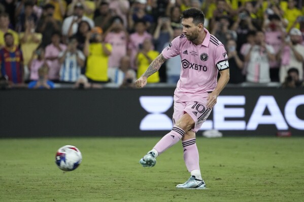 Inter Miami forward Lionel Messi (10) scores during penalty kicks after the the Leagues Cup championship soccer match between Inter Miami and Nahsville SC ended in a draw, Saturday, Aug. 19, 2023, in Nashville, Tenn. Miami won on penalty kicks. (AP Photo/George Walker IV)