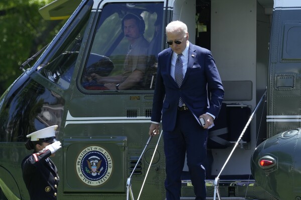 President Joe Biden steps off of Marine One on the South Lawn of the White House in Washington, Friday, April 26, 2024, as he returns from a trip to New York. (AP Photo/Susan Walsh)