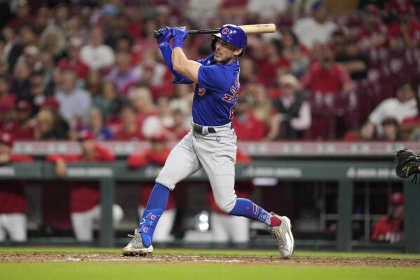 Wisdom's 3 hits, 6-run seventh, power Cubs over Reds 12-5