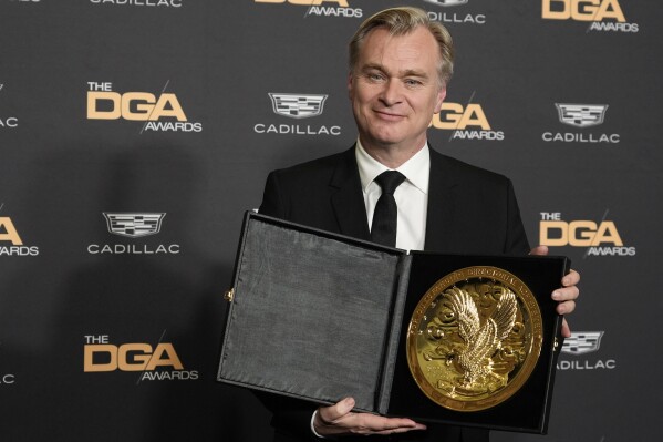 Christopher Nolan, director of the film "Oppenheimer," poses with his DGA Award for Theatrical Feature Film backstage at the 76th DGA Awards, Saturday, Feb. 10, 2024, in Beverly Hills, Calif. (APPhoto/Chris Pizzello)