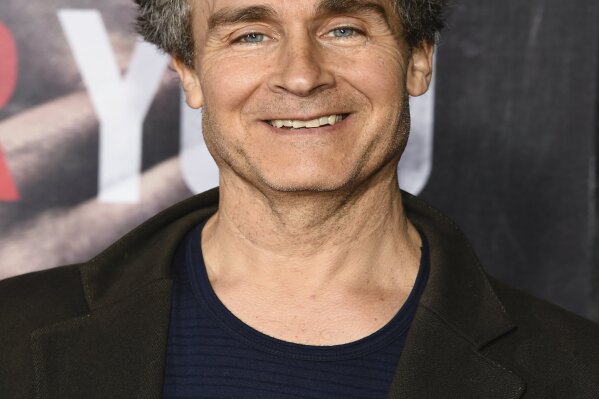 FILE - Doug Liman attends the premiere of "A Quiet Place" on April 2, 2018, in New York. In four months, in the middle of a pandemic and widespread shutdowns, filmmaker Doug Liman and his team wrote, shot and edited a glossy Harrods heist film in London with Anne Hathaway and Chiwetel Ejiofor. The result, “Locked Down,” comes to HBO Max Thursday. (Photo by Evan Agostini/Invision/AP, File)