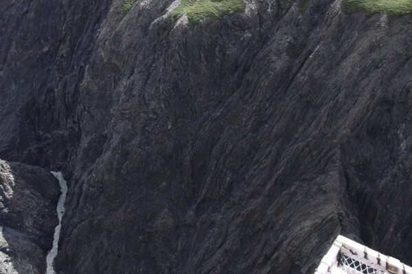 In this photo provided by the National Park Service is a ravine on a tributary of the West Fork of the Yenta River inside Alaska's Denali National Park and Preserve where a small airplane crashed, killing a pilot and a hunter on Aug. 10, 2023. Park officials on Monday, Aug. 21, 2023, said recovering the bodies of two men killed in the crash cannot be performed safely at this time. (National Park Service via AP)