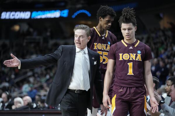 St. John's coach Rick Pitino throws out first pitch to Donovan