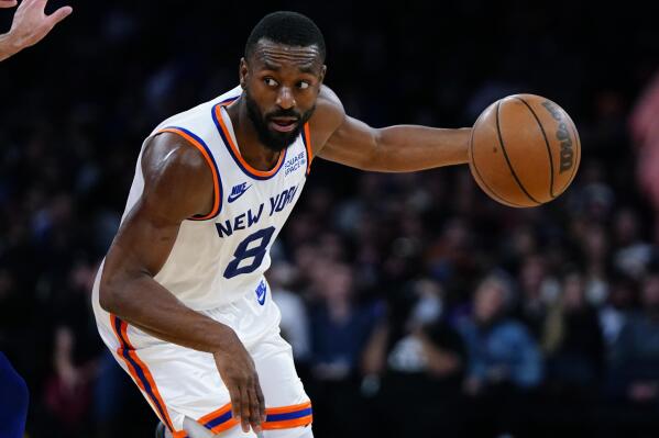 New York Knicks' Kemba Walker (8) drives toward the basket during the second half of an NBA basketball game against the Philadelphia 76ers Tuesday, Oct. 26, 2021, in New York. The Knicks won 112-99. (AP Photo/Frank Franklin II)