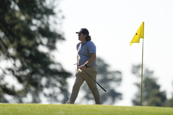 Neal Shipley walks off the third green during a practice round in preparation for the Masters golf tournament at Augusta National Golf Club Monday, April 8, 2024, in Augusta, Ga. (AP Photo/Ashley Landis)