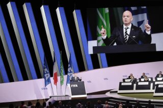 FIFA President Gianni Infantino delivers his speech during the 69th FIFA congress in Paris, Wednesday, June 5, 2019. Hours ahead of his re-election unopposed, Infantino tells 211 member federations that today “nobody talks about crisis.” (AP Photo/Alessandra Tarantino)