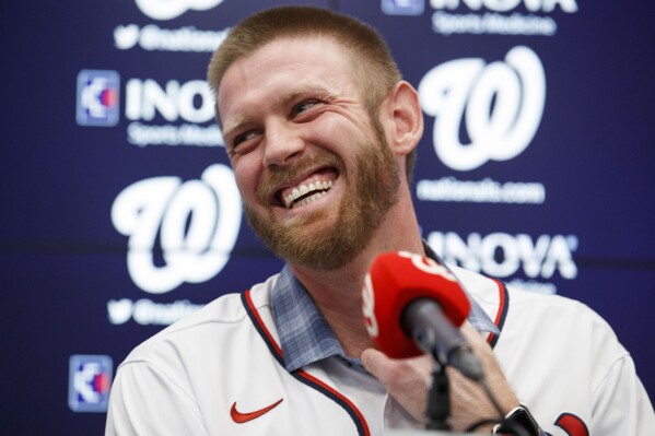 FILE - In this Dec. 17, 2019, file photo, Washington Nationals pitcher Stephen Strasburg smiles during a baseball media availability at Nationals Park in Washington, Dec. 17, 2019. Nationals pitcher Stephen Strasburg has decided to announce his retirement, ending a career that began as a No. 1 draft pick, included 2019 World Series MVP honors and was derailed by injuries, according to a person with knowledge of the situation. The person spoke to The Associated Press on condition of anonymity Thursday, Aug. 24, 2023, because Strasburg has not spoken publicly about his plans.(AP Photo/Alex Brandon, File)