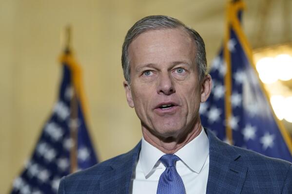 FILE - Sen. John Thune, R-S.D., talks with reporters on Capitol Hill in Washington, Jan. 20, 2022. Thune is running for his reelection in the Nov. 8 election. (AP Photo/Susan Walsh, File)