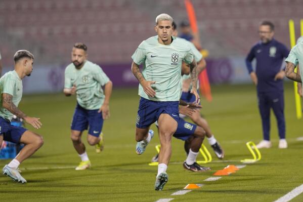 Brazil's Pedro exercises during a training session at the Grand Hamad stadium in Doha, Qatar, Thursday, Dec. 1, 2022. Brazil will face Cameroon in a group G World Cup soccer match on Dec. 2. (AP Photo/Andre Penner)