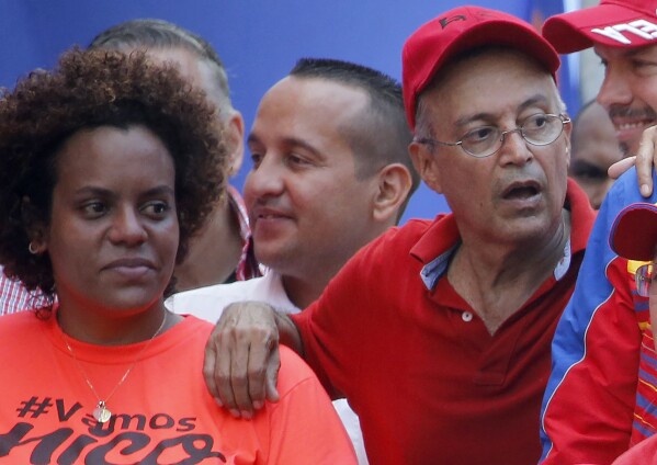 Luis Alfredo Motta Dominguez, right, attends a pro-government rally in Caracas, Venezuela, on April 6, 2019.(AP Photo/Ariana Cubillos, File)