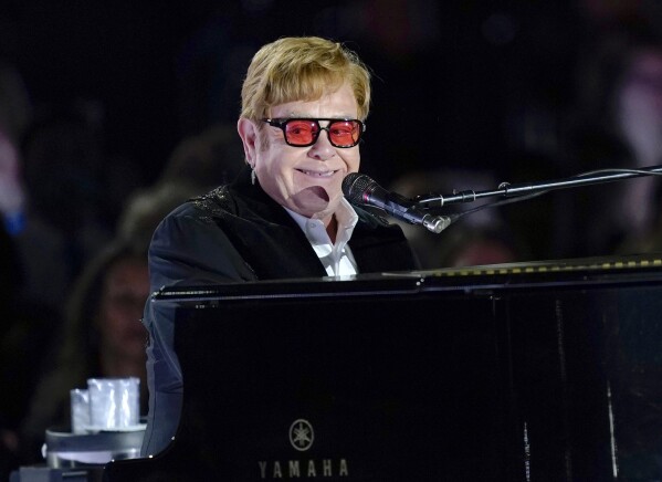 FILE - Elton John performs on the South Lawn of the White House in Washington on Sept. 23, 2022. John has achieved EGOT status. The famed British singer-pianist secured an Emmy Award on Monday night, Jan. 15, 2024, for best variety special (live) for “Elton John Live: Farewell from Dodger Stadium,” a three-hour concert documentary that streamed on Disney +. (AP Photo/Susan Walsh, File)
