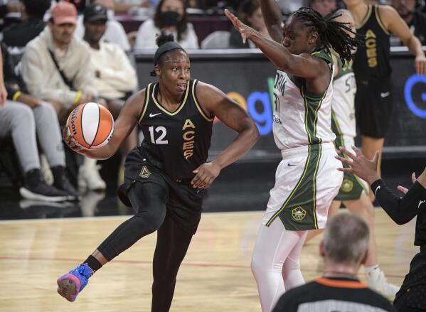 A WNBA playoff game featured three couples on the court this week