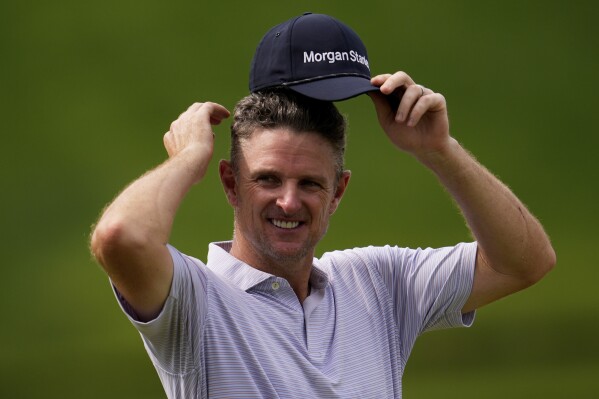Justin Rose, of England, waits to play on the 14th hole during the second round of the PGA Championship golf tournament at the Quail Hollow Club, Friday, May 16, 2025, in Charlotte, N.C. (AP Photo/George Walker IV)