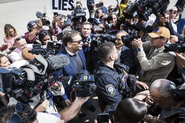 CORRECTS PARTY AFFILIATION - FILE - Rep. George Santos, R-N.Y., speaks to reporters as he leaves the federal courthouse in Central Islip, N.Y., Wednesday, May 10, 2023. The House Ethics panel says it has found 鈥渟ubstantial evidence鈥� of lawbreaking by Republican Rep. George Santos of New York and has referred its findings to the Justice Department. The committee said Thursday that Santos鈥� conduct warrants public condemnation, is beneath the dignity of the office, and has brought severe discredit upon the House. AP Photo/Seth Wenig, File)