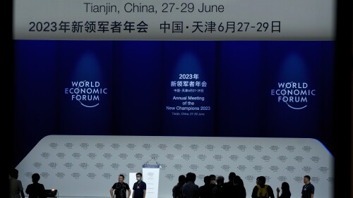 Members of the official media set up their camera position at the plenary hall of the Meijiang Convention and Exhibition Center ahead for the World Economic Forum's Annual Meeting of the New Champions 2023 in northern China's Tianjin Municipality, Monday, June 26, 2023. Social media users are sharing a video misrepresenting remarks Eswar Prasad, an economics professor from Cornell University, made at the event about the benefits and the dangers of central bank digital currencies. (AP Photo/Andy Wong)<br/><br/>