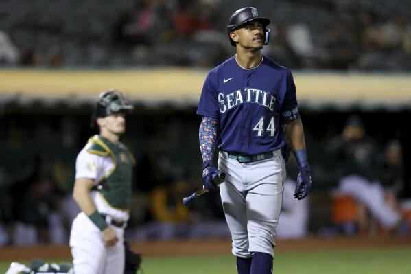 Seattle Mariners' Julio Rodriguez (44) walks back to the dugout after striking out against the Oakland Athletics during the fifth inning of a baseball game in Oakland, Calif., Tuesday, Sept. 20, 2022. (AP Photo/Jed Jacobsohn)