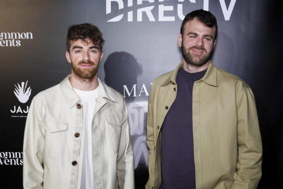 File - The Chainsmokers arrive at the day one of Maxim Big Game Weekend on Feb. 11, 2022, in Los Angeles. One of The Chainsmokers' latest hits is "High" and they're hoping to live up to their lyrics. The hit-making duo of Drew Taggart and Alex Pall have signed up to get into a pressurized capsule tethered to a stratospheric balloon in a few years and perform some 20 miles above the Earth. (Photo by Willy Sanjuan/Invision/AP, File)