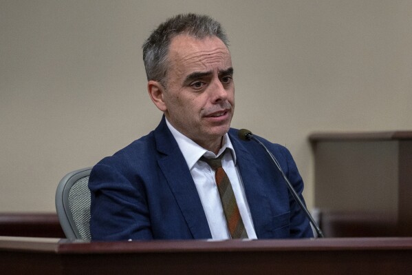 Director Joel Souza testifies in the trial against Hannah Gutierrez-Reed in state district court in Santa Fe, N.M., on Friday, March 1, 2024. Gutierrez-Reed was working as the armorer on the movie 