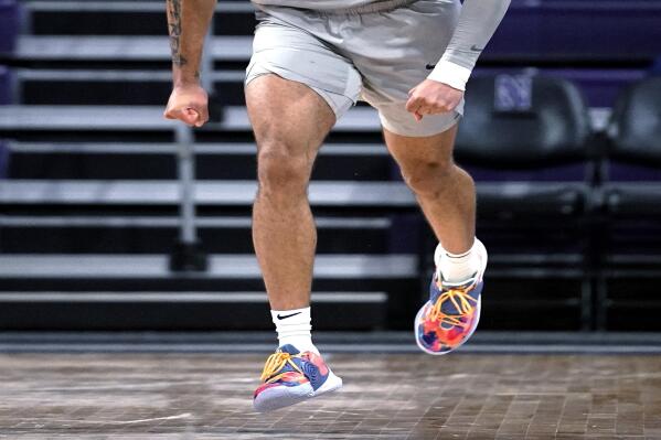 Penn State forward Seth Lundy reacts after hitting a 3-point shot during the second half of the team's NCAA college basketball game against Northwestern in Evanston, Ill., Wednesday, Jan. 5, 2022. Penn State won 74-70. (AP Photo/Nam Y. Huh)